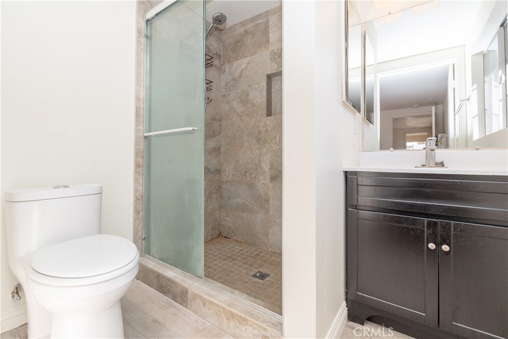 16302 Rochlen Street Hacienda Heights, CA 91745 - Photo 13 of 17 a bathroom with a sink a toilet and shower