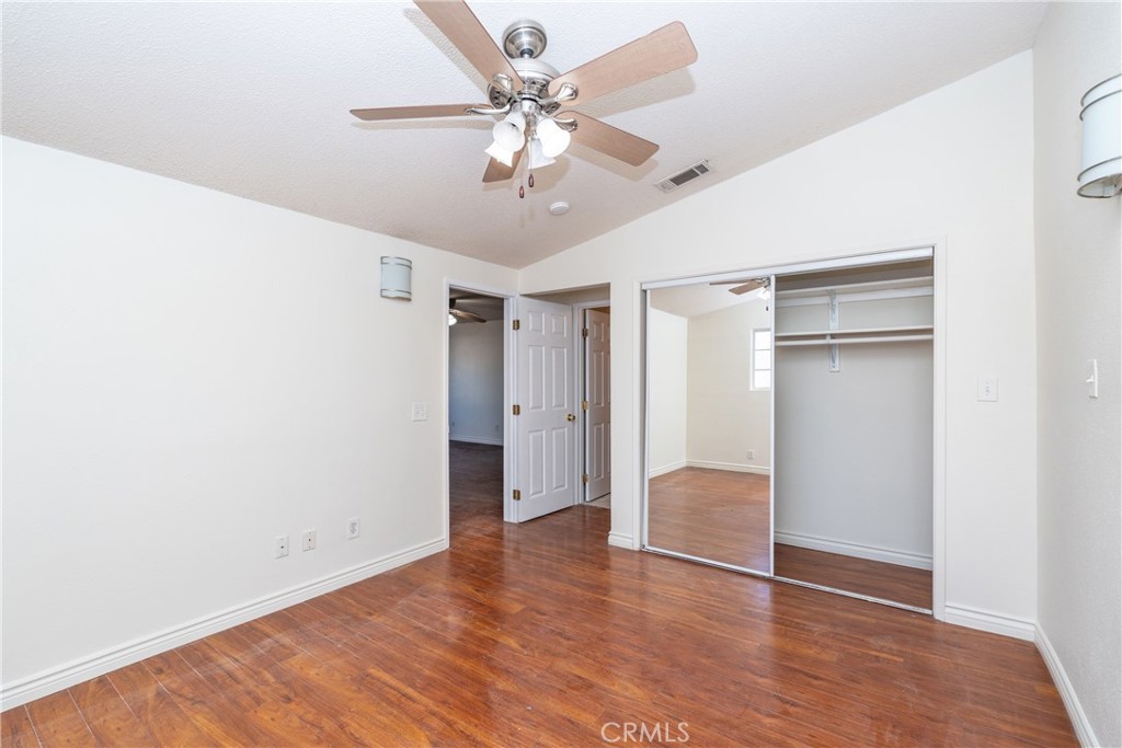 16302 Rochlen Street Hacienda Heights, CA 91745 - Photo 8 of 17 a view of an empty room with wooden floor