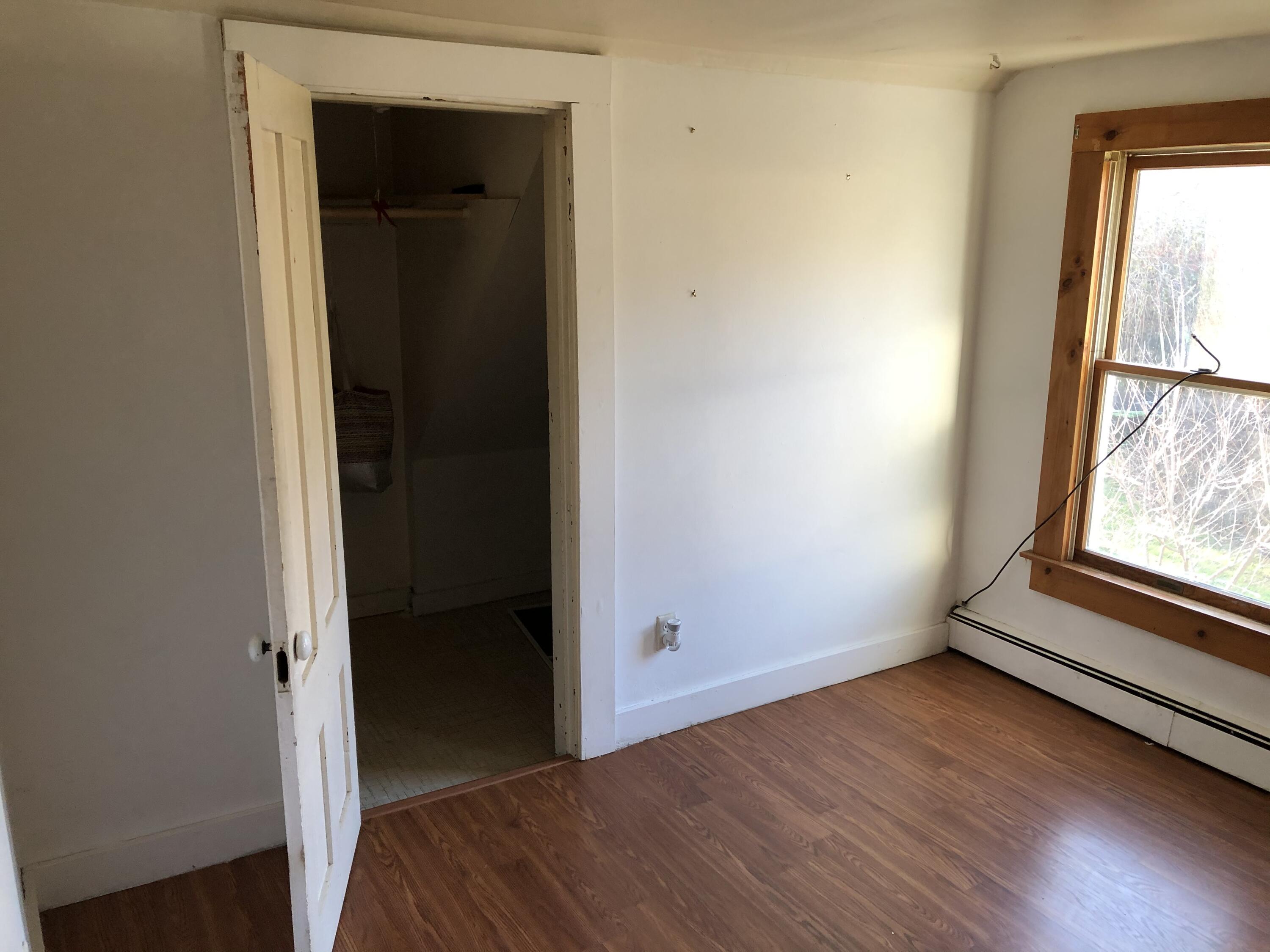 347 Santuit-Newtown Road Marstons Mills, MA 02648 - Photo 17 of 26 an empty room with windows and closet