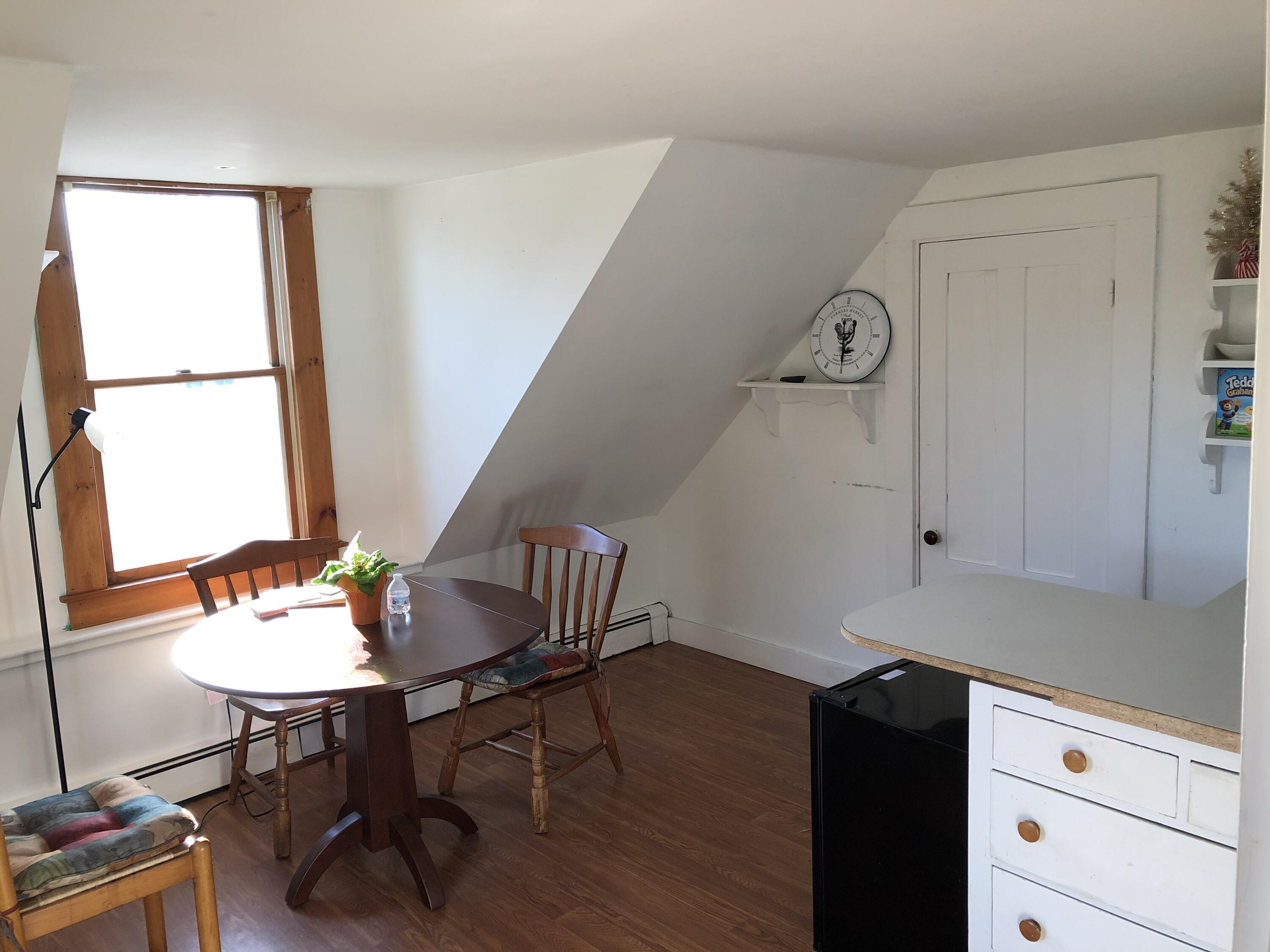 347 Santuit-Newtown Road Marstons Mills, MA 02648 - Photo 19 of 26 a living room with furniture and wooden floor