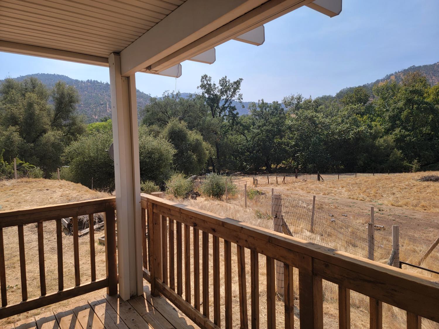37041 Dunlap Road Squaw Valley, CA 93675 - Photo 15 of 24 a view of a balcony with wooden fence