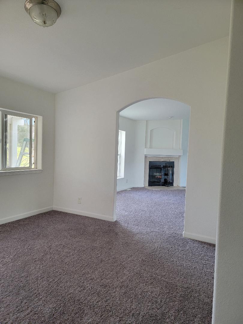 37041 Dunlap Road Squaw Valley, CA 93675 - Photo 17 of 24 a view of empty room with a fireplace