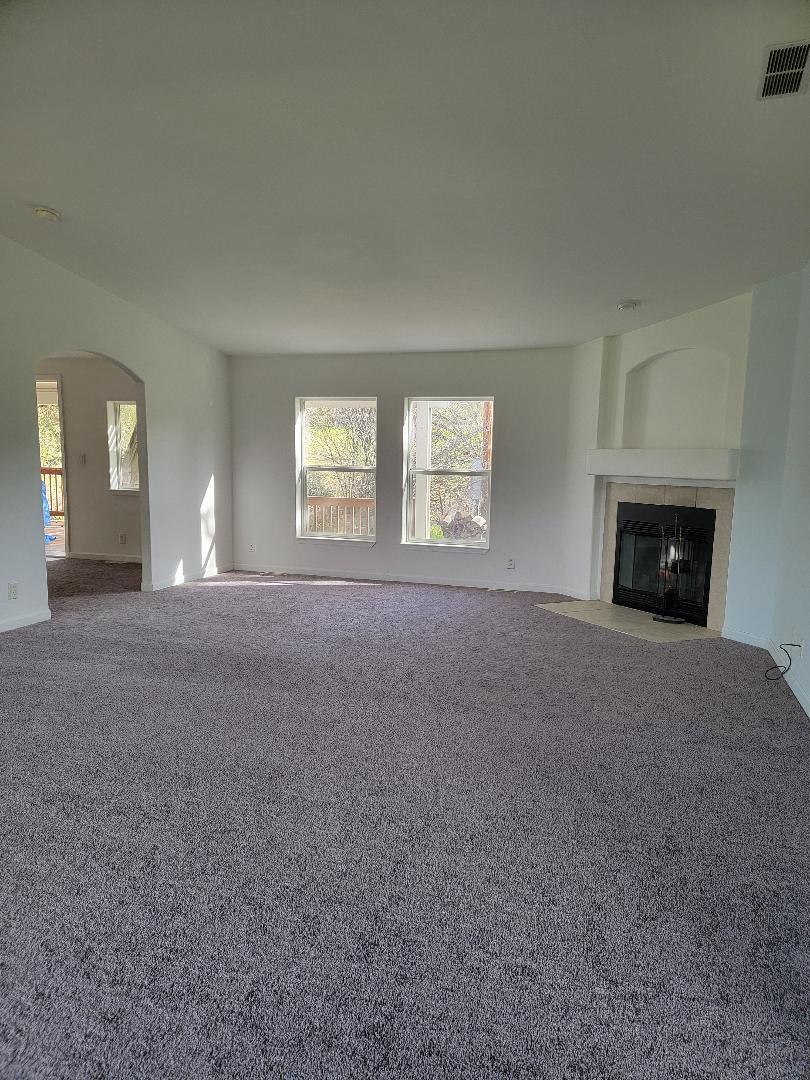 37041 Dunlap Road Squaw Valley, CA 93675 - Photo 20 of 24 a view of empty room with a fireplace
