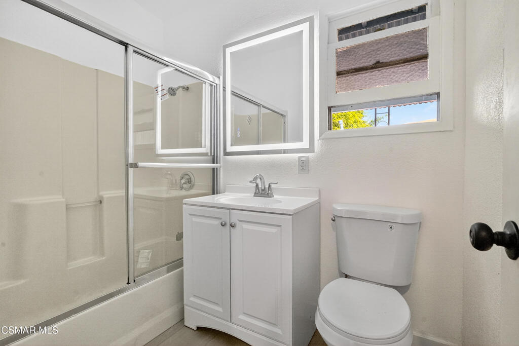 2251 Bryce Road El Monte, CA 91732 - Photo 6 of 16 a bathroom with a sink a toilet and shower