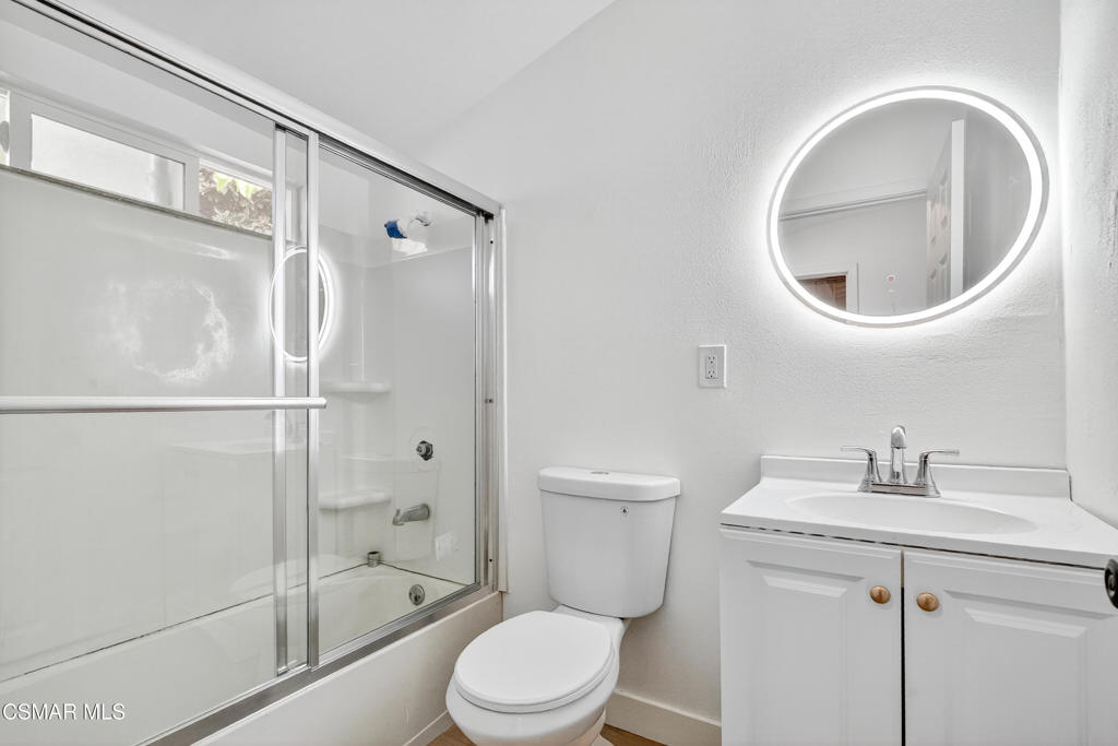 2251 Bryce Road El Monte, CA 91732 - Photo 9 of 16 a bathroom with a toilet sink and a mirror