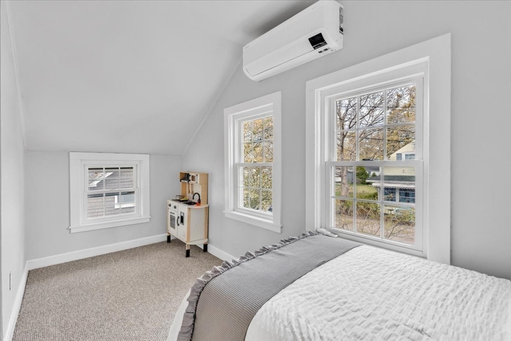 6 Everett Avenue Wareham, MA 02571 - Photo 11 of 33 a bedroom with a large bed and a window