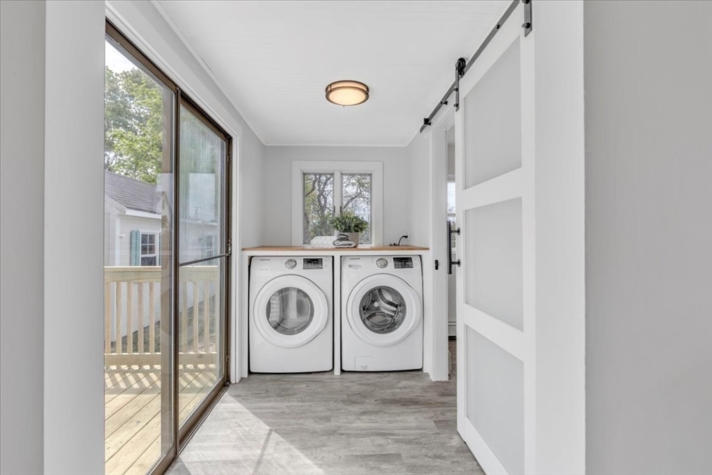6 Everett Avenue Wareham, MA 02571 - Photo 12 of 33 a view of a storage & utility room with washer and dryer