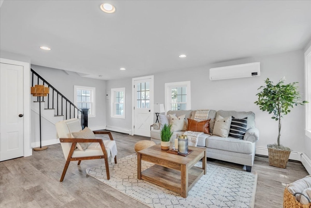 6 Everett Avenue Wareham, MA 02571 - Photo 28 of 33 a living room with furniture and a potted plant
