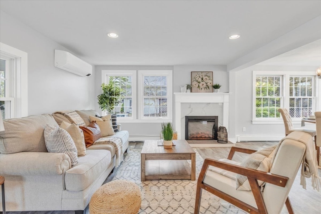 6 Everett Avenue Wareham, MA 02571 - Photo 3 of 33 a living room with furniture fireplace and window