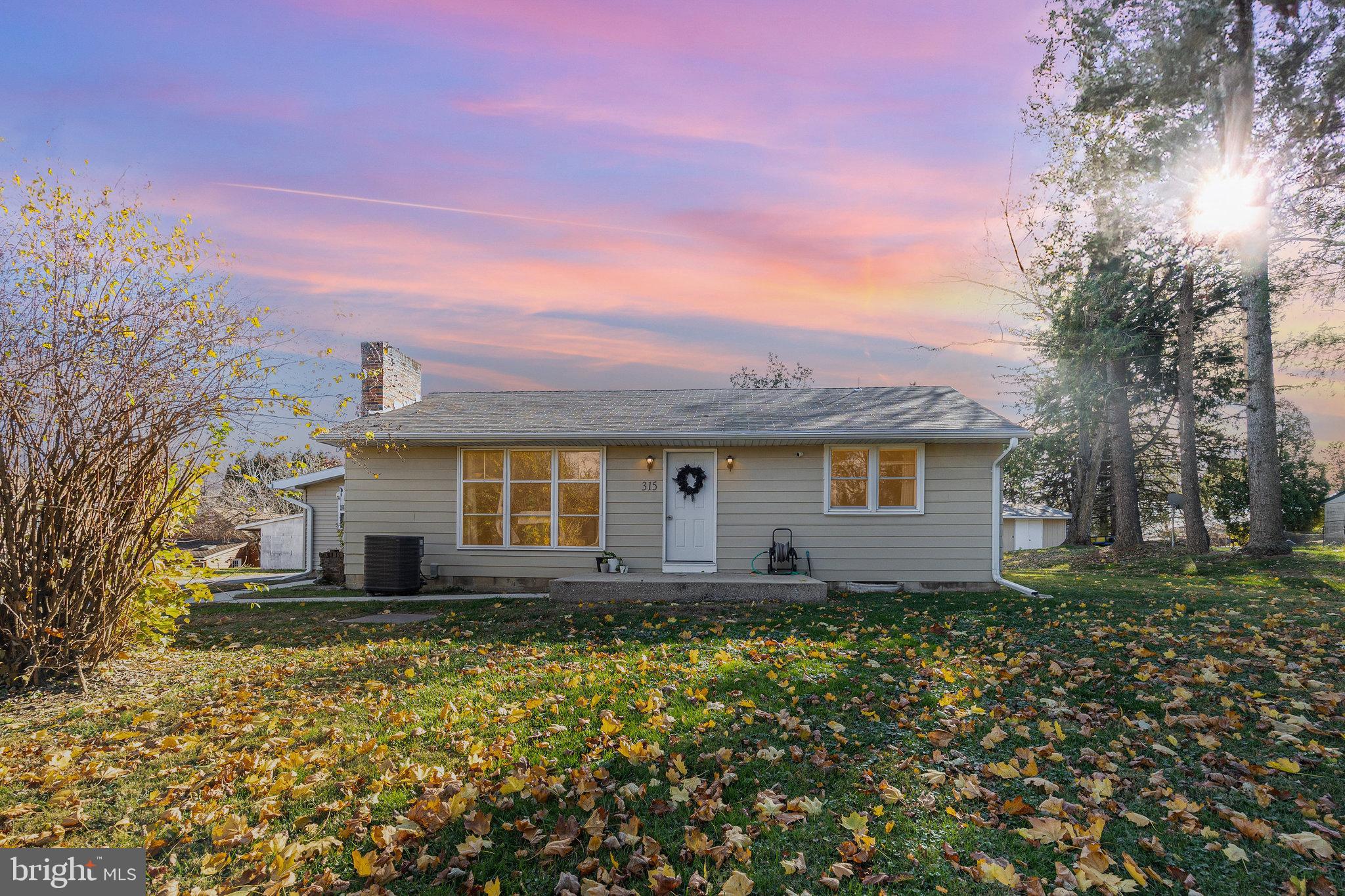 a house view with a garden space