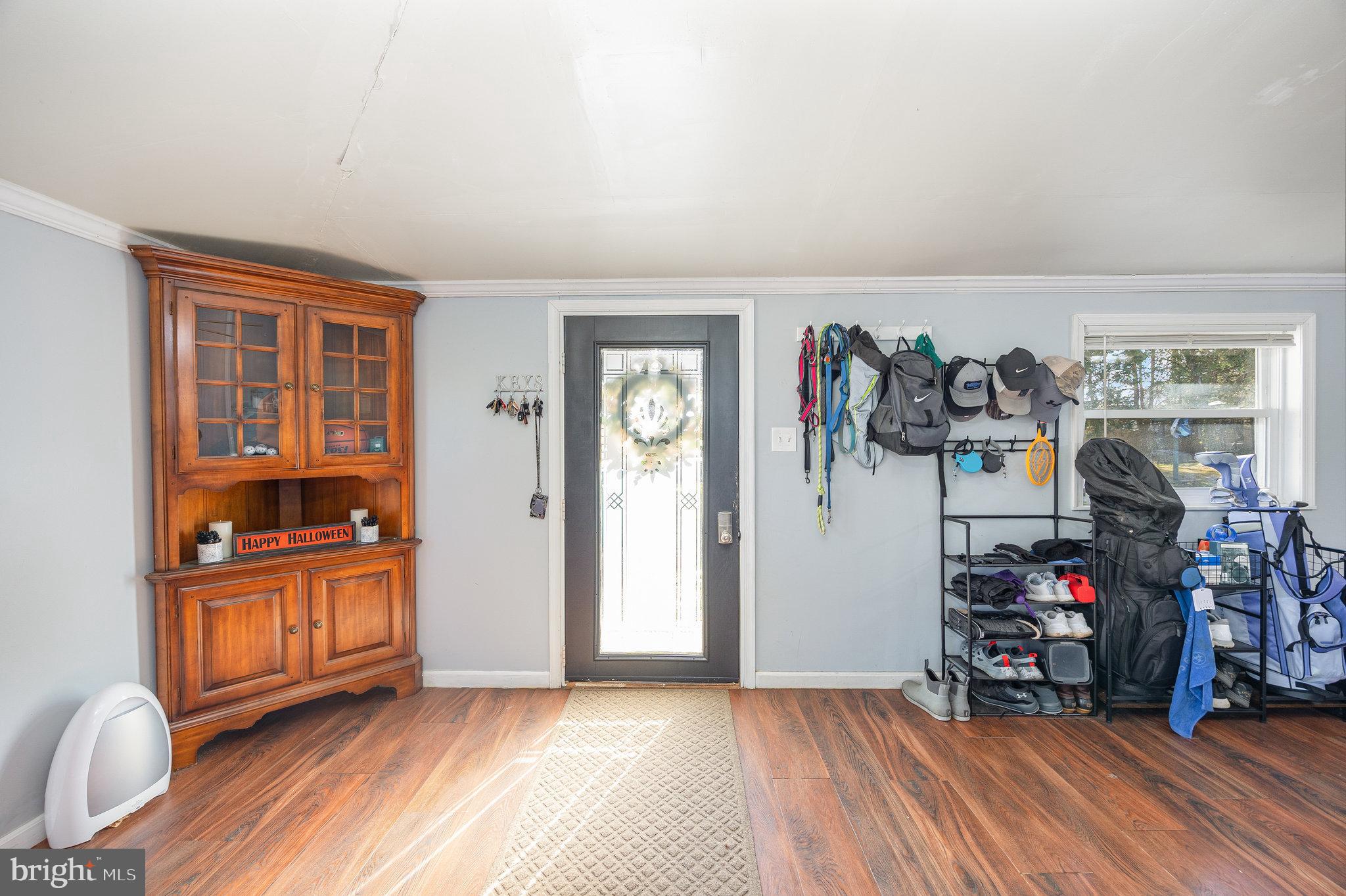 315 James Road Carlisle, PA 17013 - Photo 14 of 47 a view of a livingroom with fridge and workspace