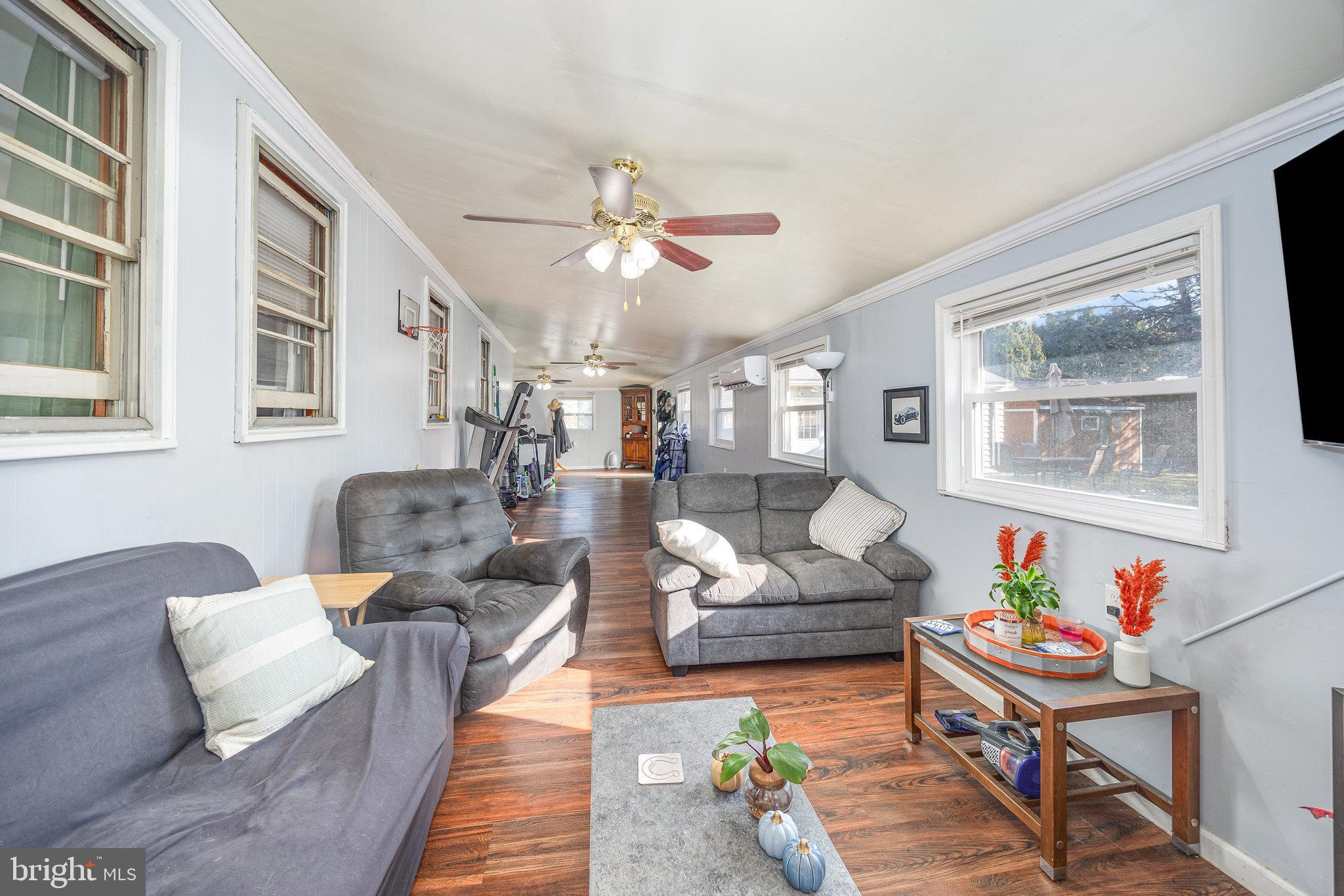 315 James Road Carlisle, PA 17013 - Photo 17 of 47 a living room with furniture and wooden floor