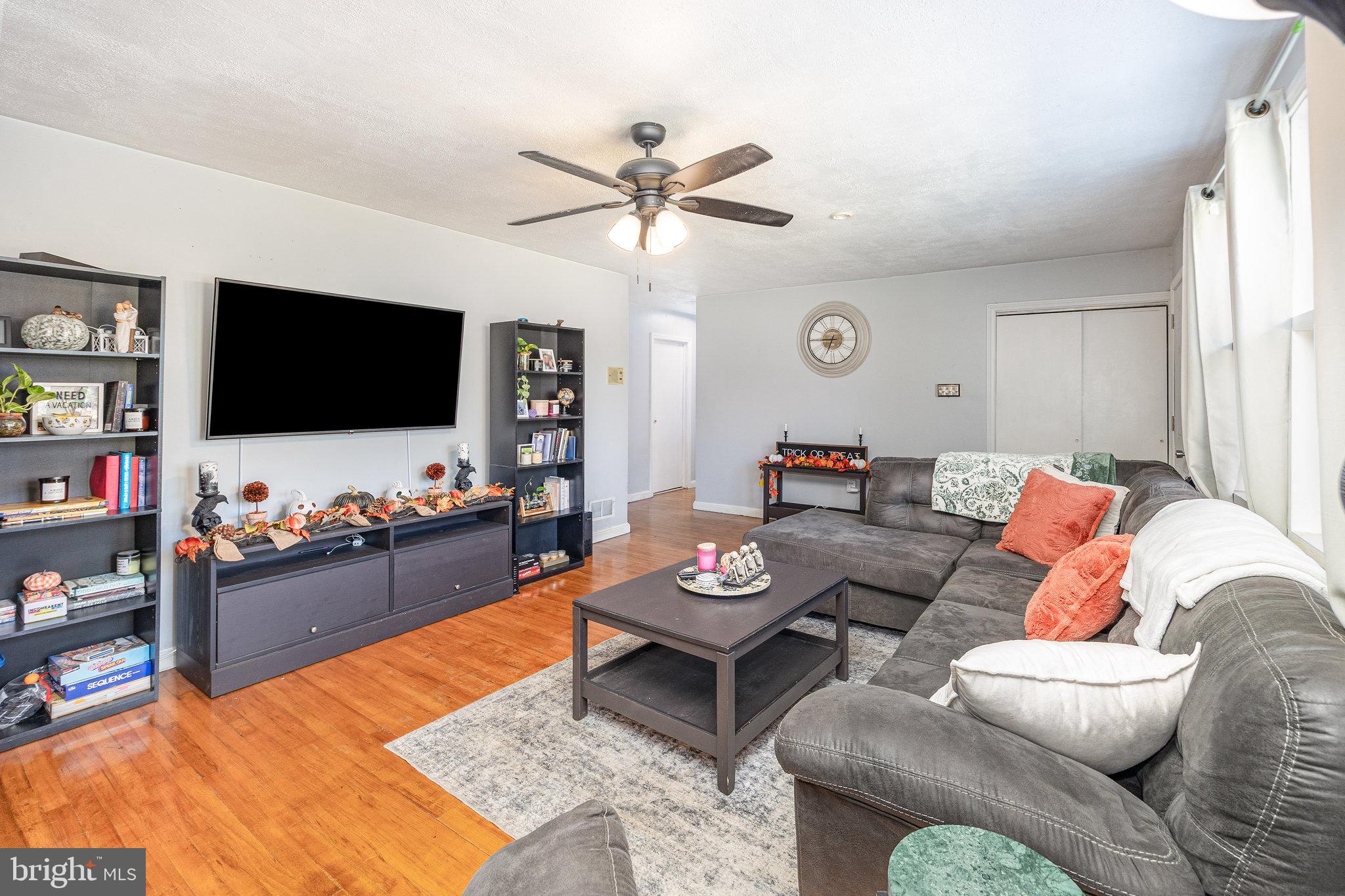 315 James Road Carlisle, PA 17013 - Photo 5 of 47 a living room with furniture and a flat screen tv