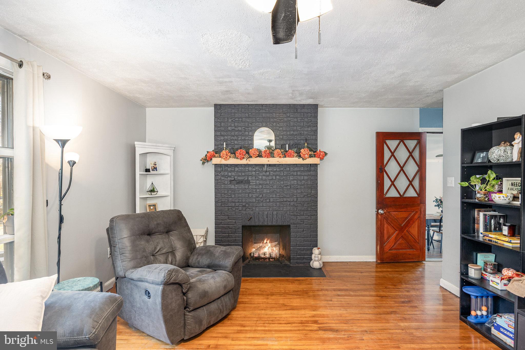 315 James Road Carlisle, PA 17013 - Photo 6 of 47 a living room with furniture and a fireplace