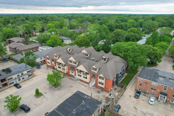 an aerial view of a house with a garden