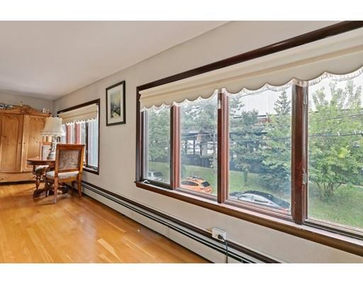 41 Bailey Road Somerville, MA 02145 - Photo 13 of 32 a living room with a large window