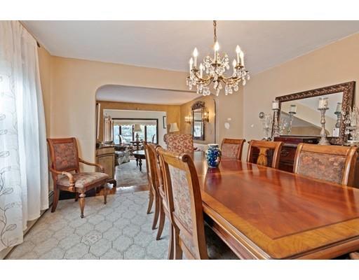 41 Bailey Road Somerville, MA 02145 - Photo 20 of 32 a view of a dining room with furniture and a chandelier
