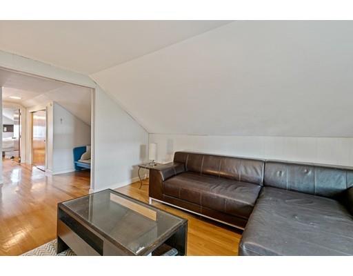 41 Bailey Road Somerville, MA 02145 - Photo 26 of 32 a living room with furniture and a couch