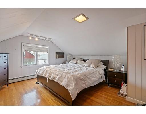 41 Bailey Road Somerville, MA 02145 - Photo 29 of 32 a bedroom with a bed and window