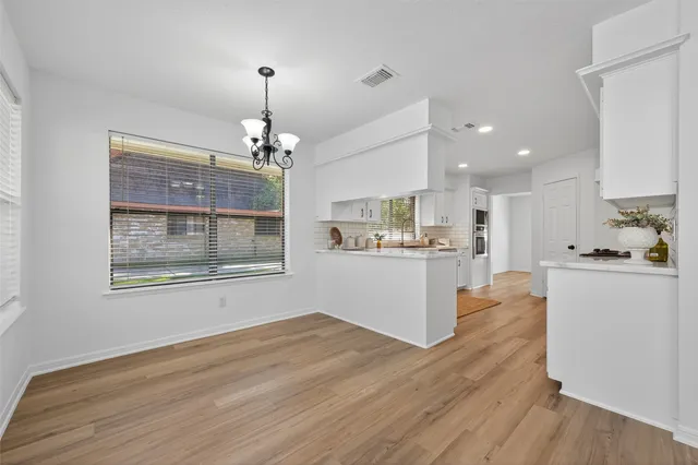 a view of a kitchen and mountain view