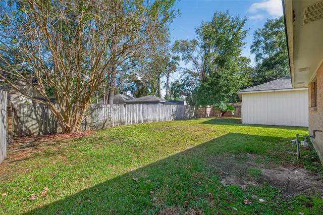 a view of a backyard with a garden