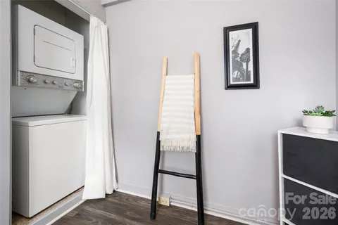a view of hallway with washer and dryer