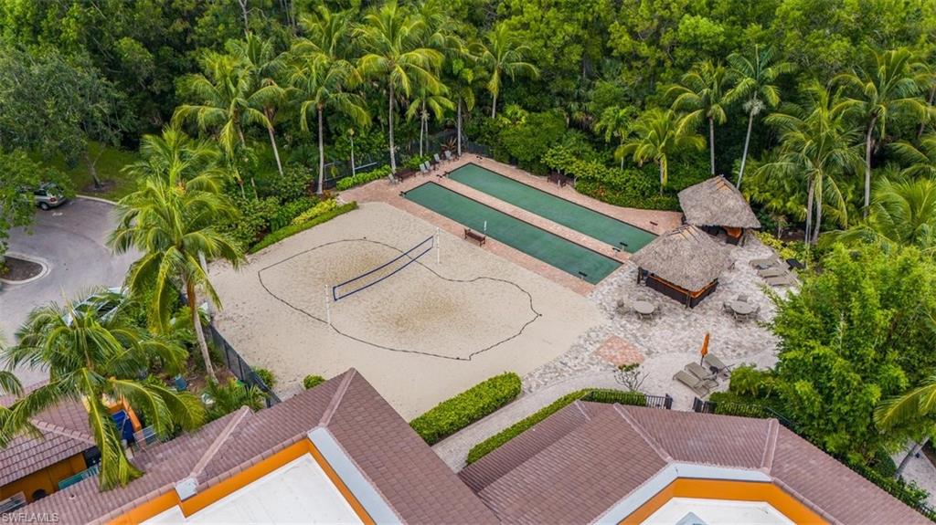 9147 Delano Street, Unit 9605 Naples, FL 34113 - Photo 20 of 27 a view of swimming pool with a yard