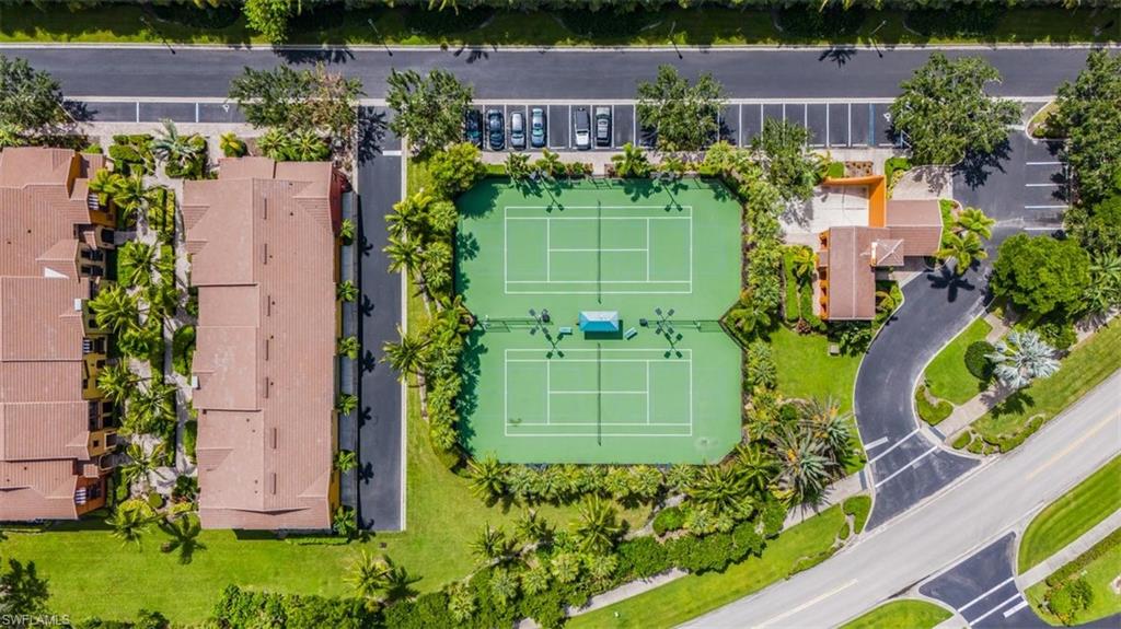 9147 Delano Street, Unit 9605 Naples, FL 34113 - Photo 22 of 27 an aerial view of a house with a garden