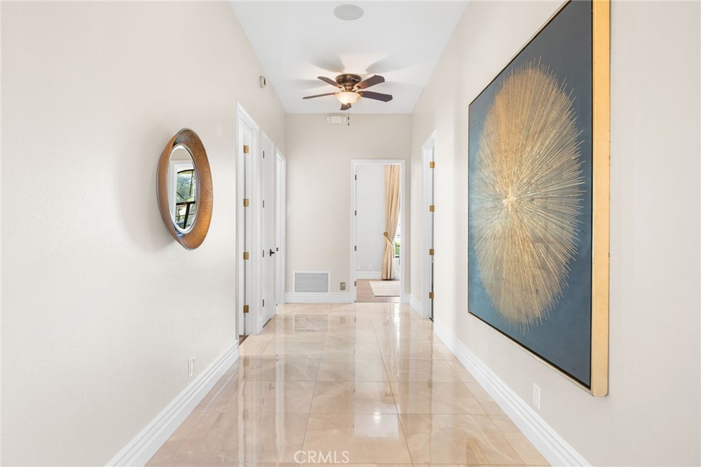 2487 Cliff Road Upland, CA 91784 - Photo 12 of 49 a view of a hallway with painted walls