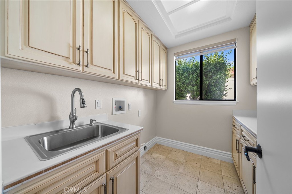 2487 Cliff Road Upland, CA 91784 - Photo 20 of 49 a kitchen with stainless steel appliances granite countertop a sink and a window