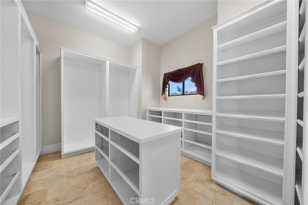 2487 Cliff Road Upland, CA 91784 - Photo 25 of 49 a view of an empty room with a closet