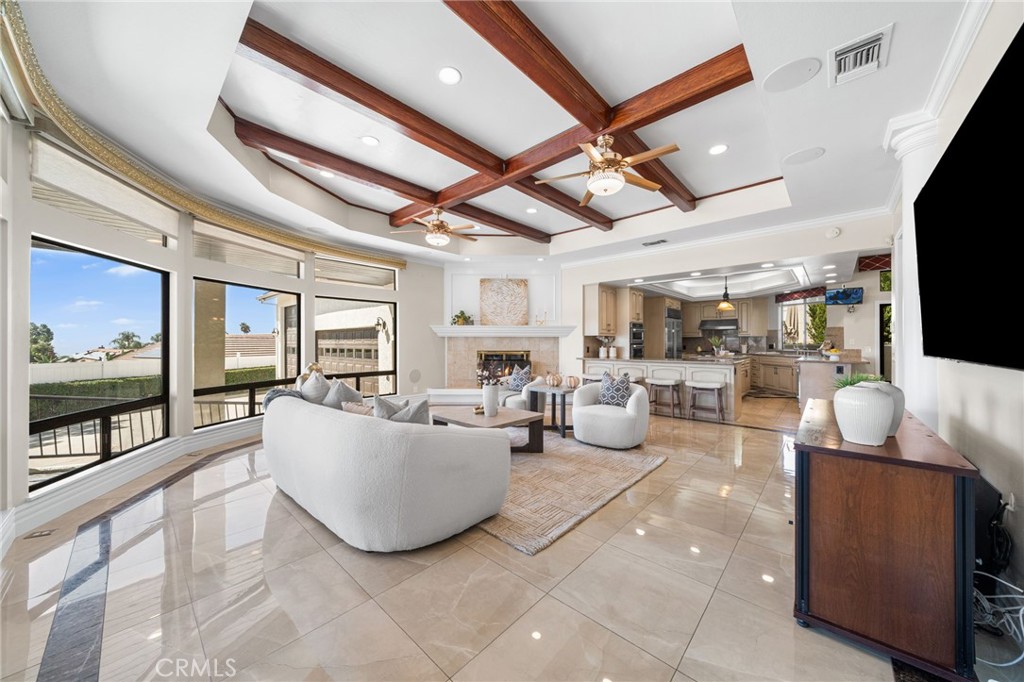 2487 Cliff Road Upland, CA 91784 - Photo 34 of 49 a living room with fireplace furniture and a flat screen tv