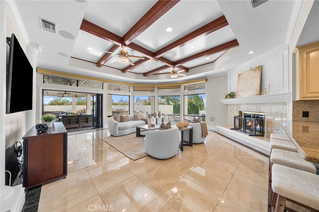 2487 Cliff Road Upland, CA 91784 - Photo 35 of 49 a living room with furniture and fireplace