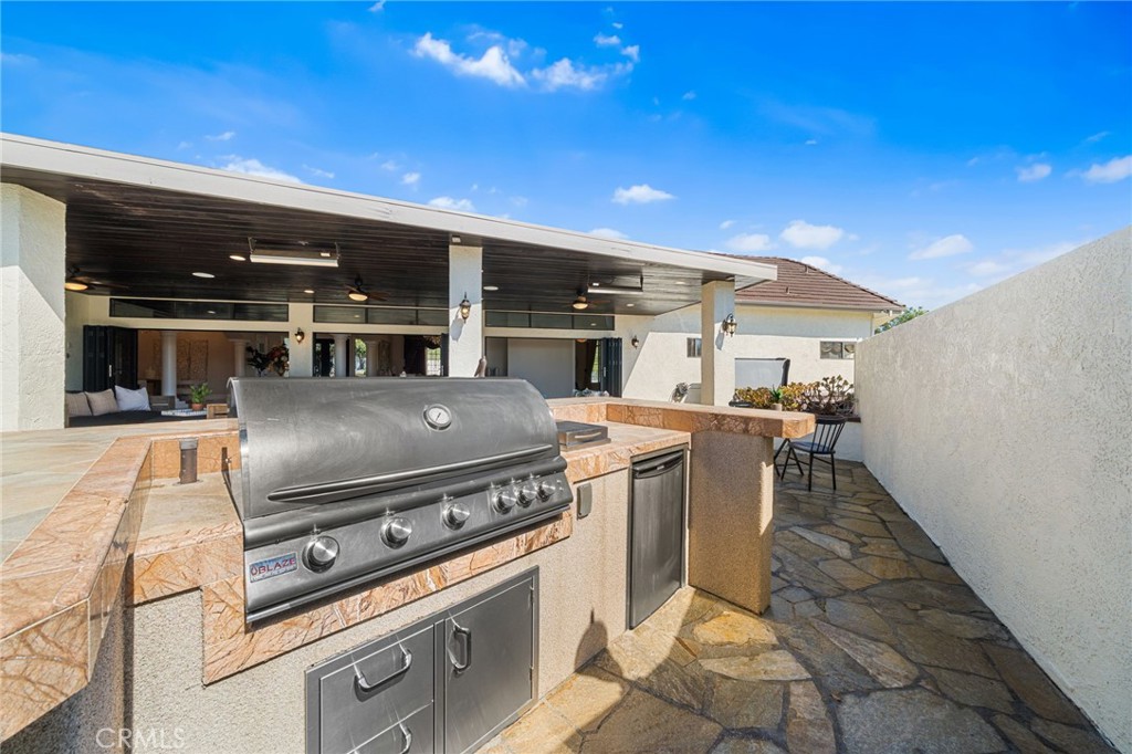 2487 Cliff Road Upland, CA 91784 - Photo 38 of 49 a kitchen with a stove and a microwave