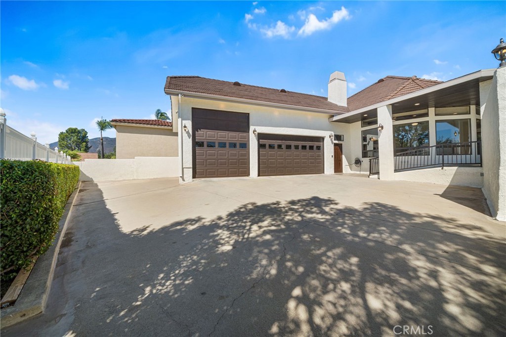 2487 Cliff Road Upland, CA 91784 - Photo 41 of 49 a front view of a house with a yard