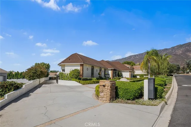 an aerial view of residential house with outdoor space and parking