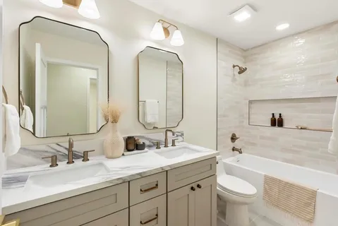 an aerial view of residential building with green space