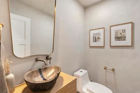 an aerial view of residential building and ocean