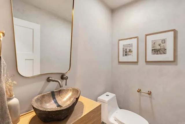 an aerial view of residential building and ocean