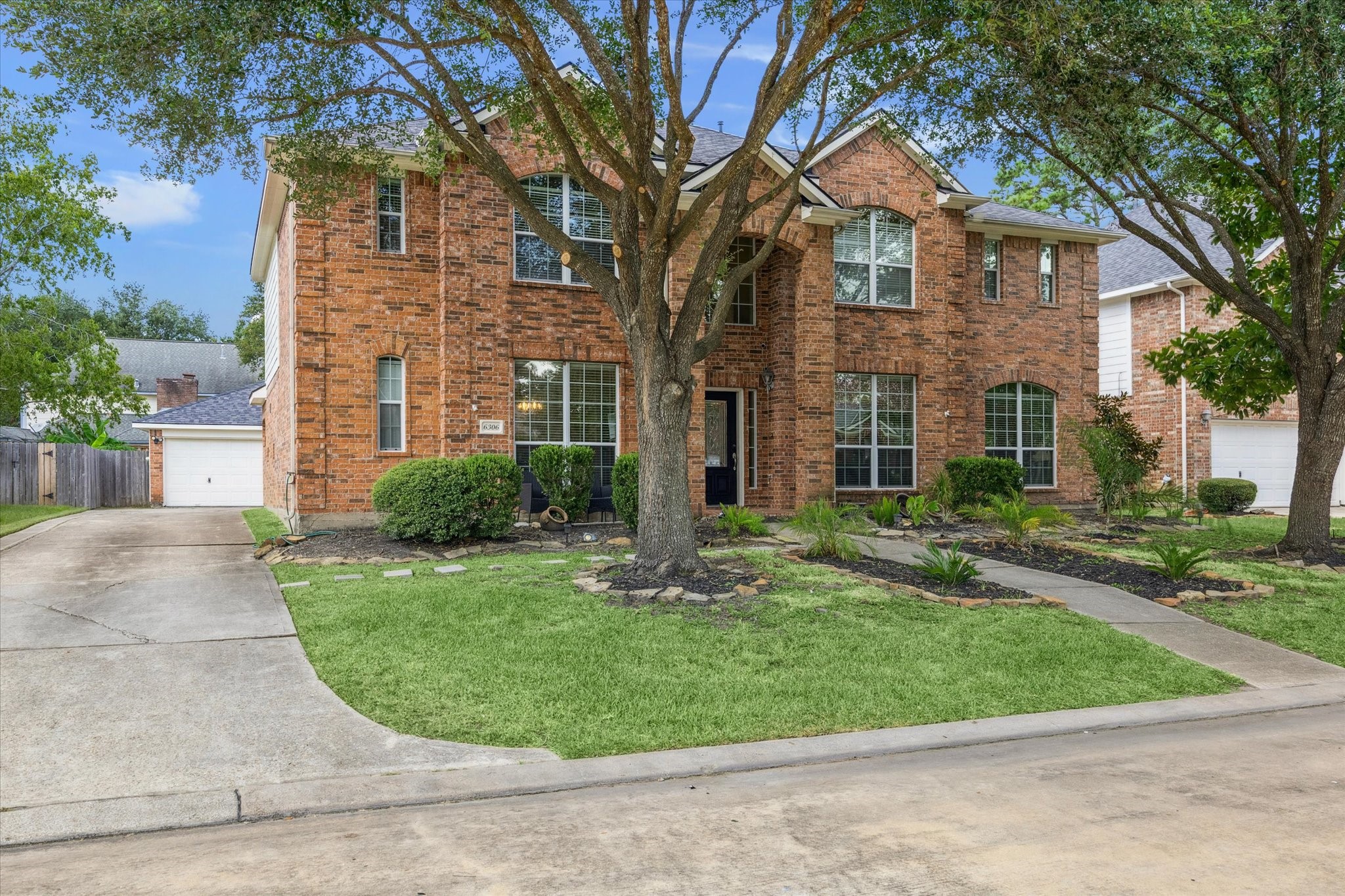 6306 Amelia Springs Drive Spring, TX 77379 - Photo 2 of 37 front view of house with a yard
