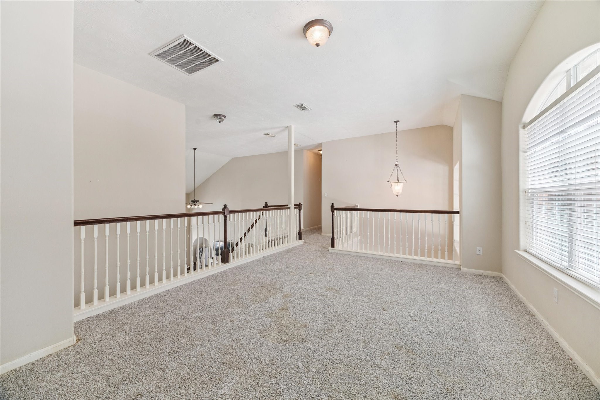 6306 Amelia Springs Drive Spring, TX 77379 - Photo 27 of 37 a view of an empty room with a window