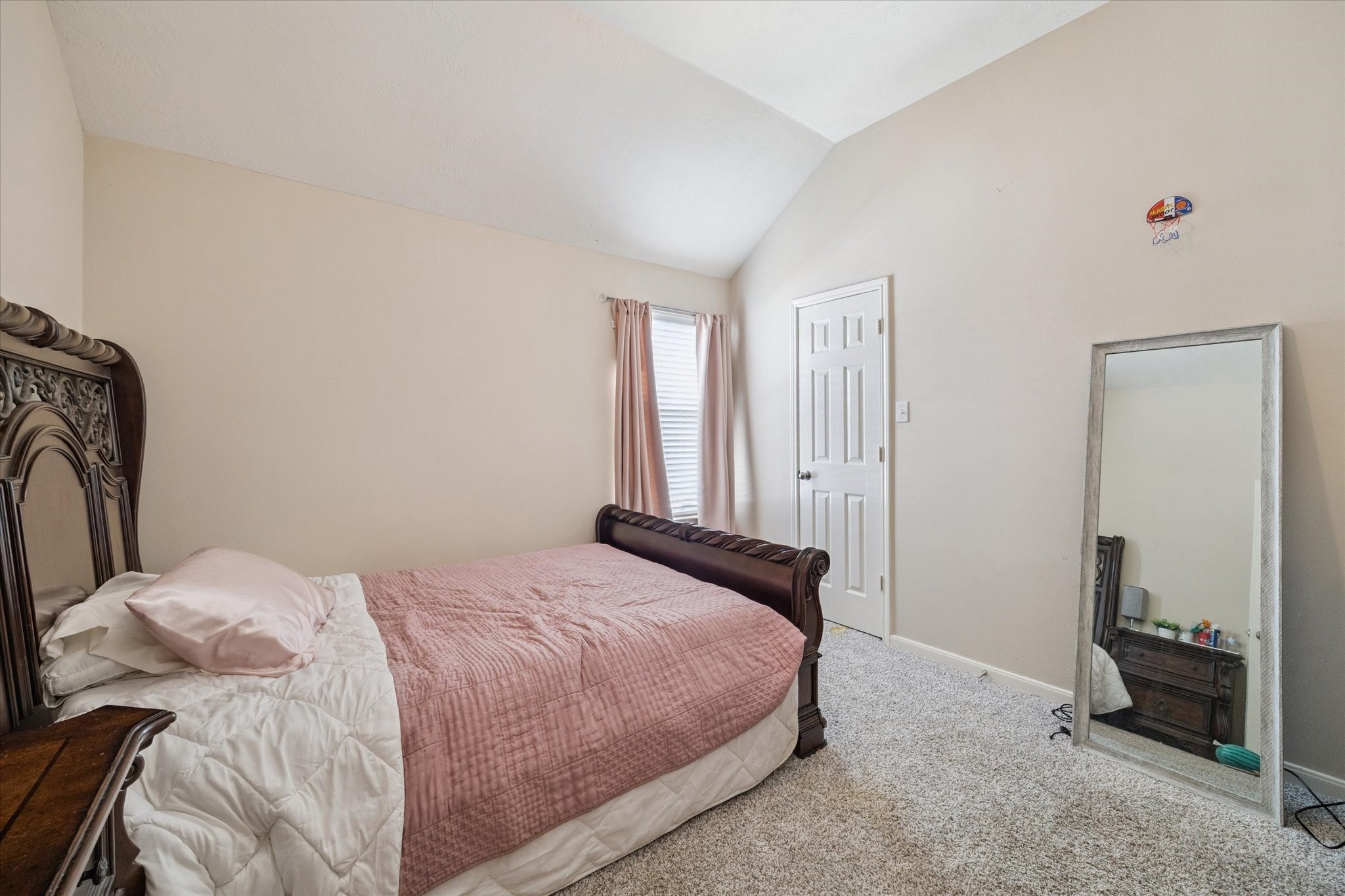 6306 Amelia Springs Drive Spring, TX 77379 - Photo 28 of 37 a bedroom with a bed and a window