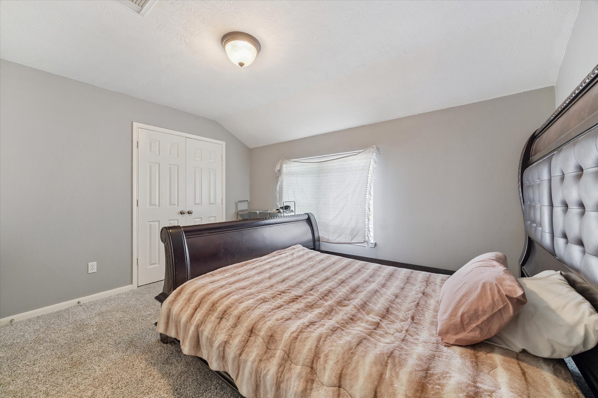 6306 Amelia Springs Drive Spring, TX 77379 - Photo 29 of 37 a bedroom with a bed and a window