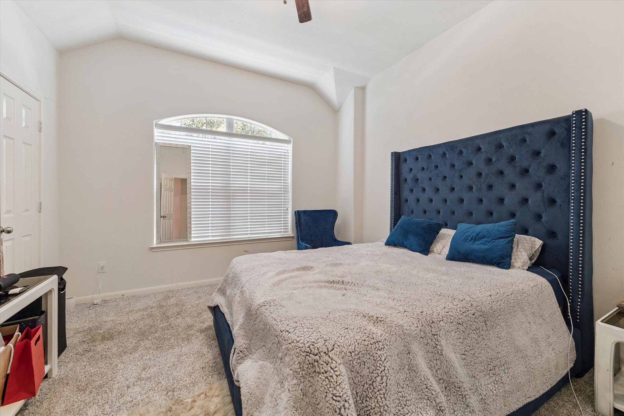 6306 Amelia Springs Drive Spring, TX 77379 - Photo 30 of 37 a bedroom with a bed and painting on the wall