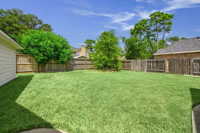 a house view with a garden space