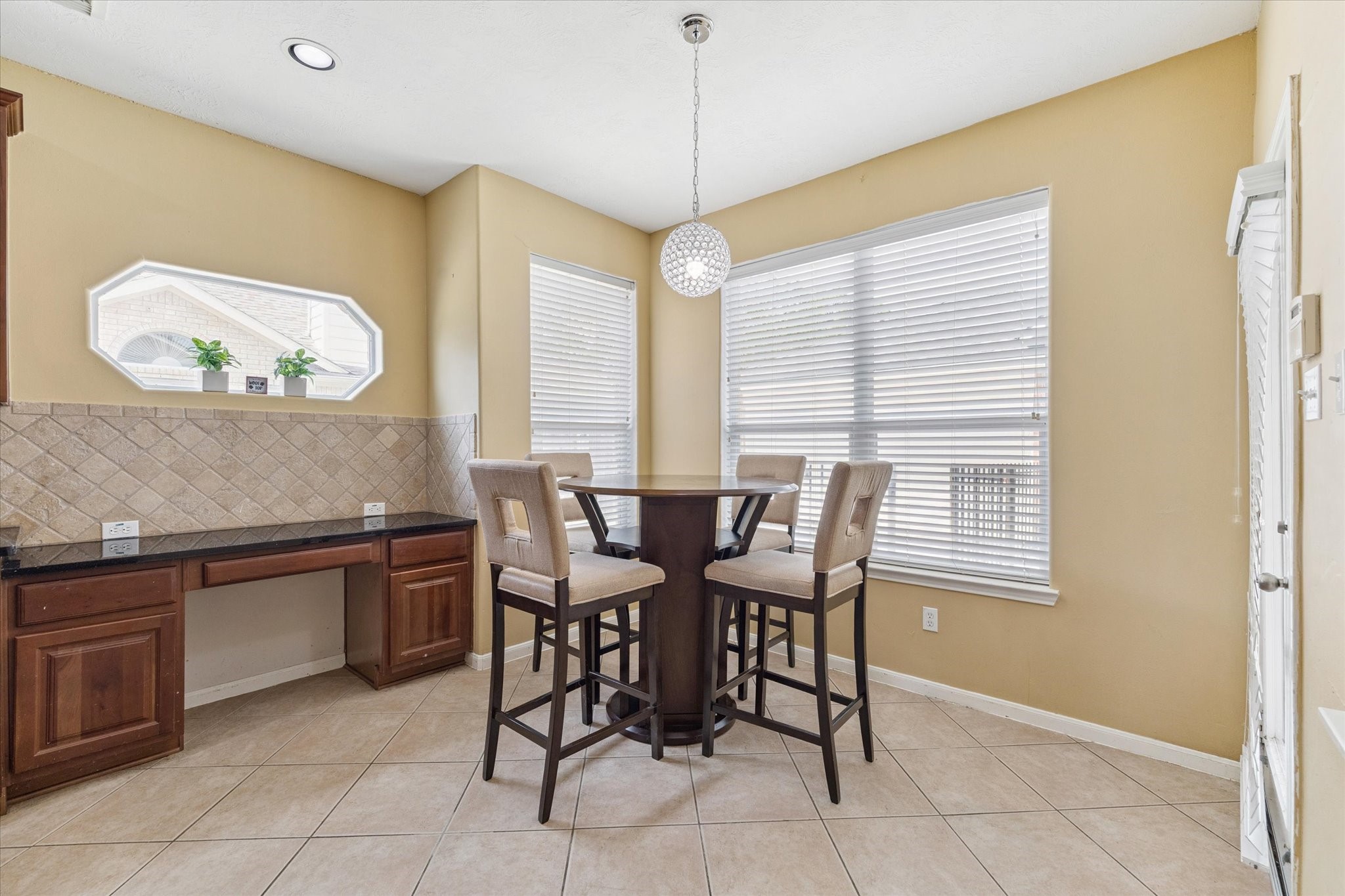 6306 Amelia Springs Drive Spring, TX 77379 - Photo 9 of 37 a view of a dining room with furniture and window