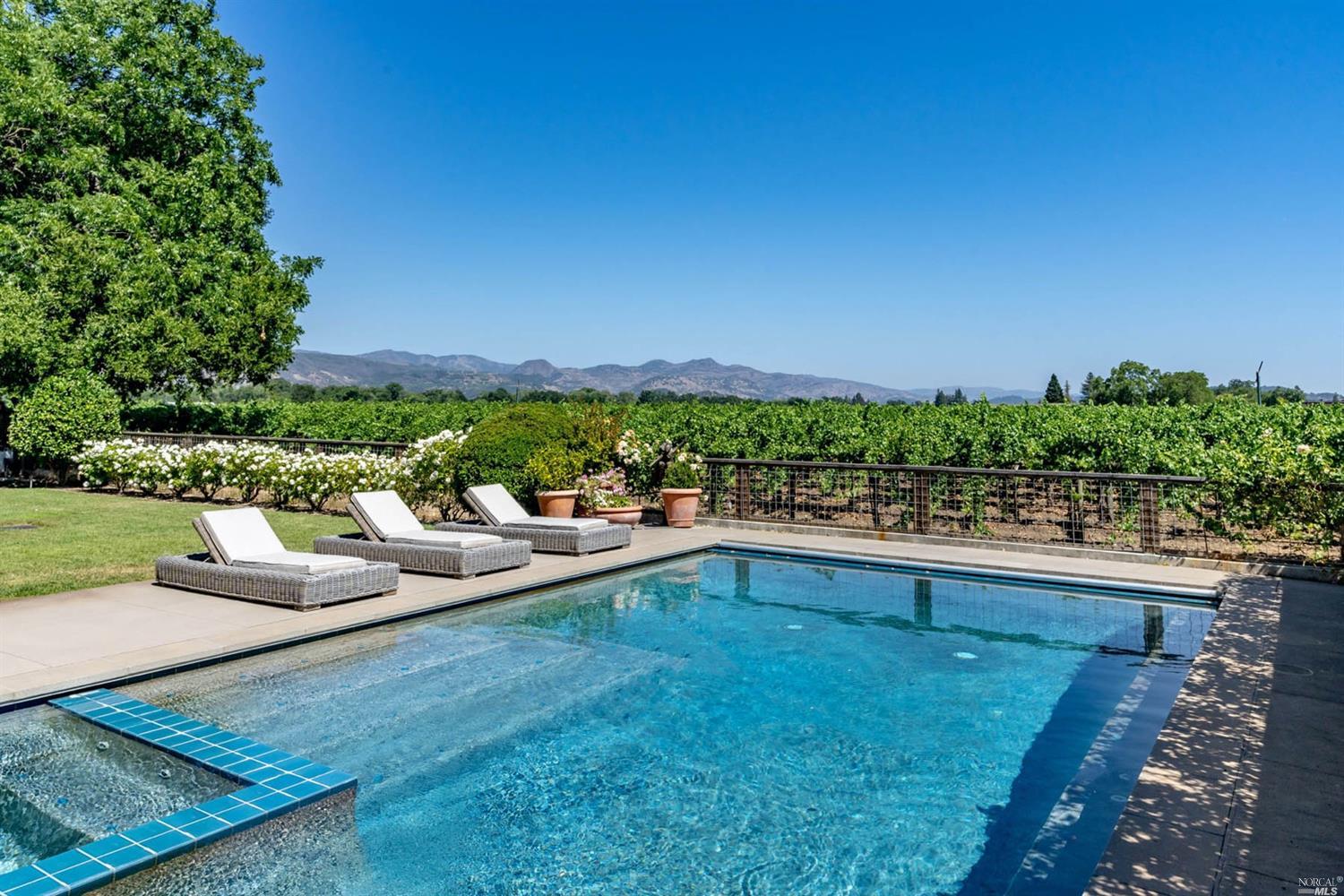 1135 Rutherford Road Rutherford, CA 94558 - Photo 1 of 1 a view of a swimming pool and lounge chairs in the terrace