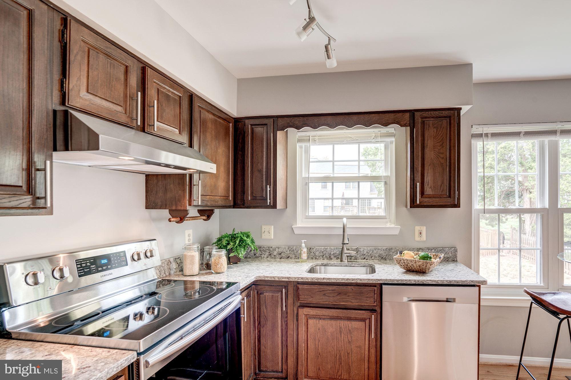 2986 Emerald Chase Drive Herndon, VA 20171 - Photo 11 of 36 New glass cook top electric range in kitchen