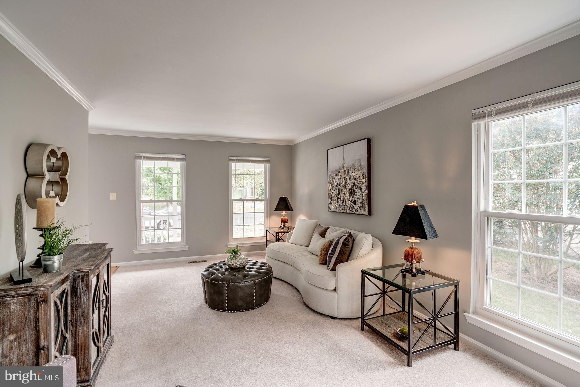 2986 Emerald Chase Drive Herndon, VA 20171 - Photo 6 of 36 Living room with crown molding detail