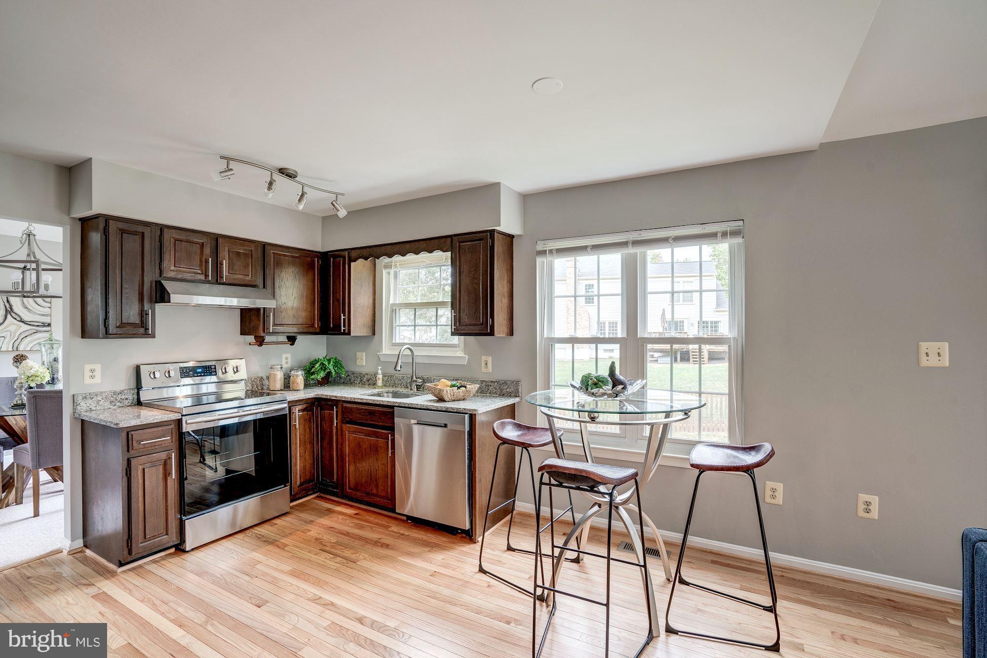 2986 Emerald Chase Drive Herndon, VA 20171 - Photo 9 of 36 Eat-in area in kitchen w/ modern fixtures